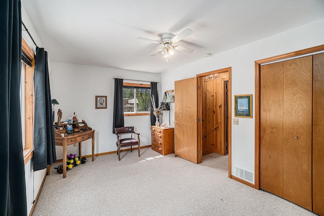 13042 Silver Lake Resort Rd, Wolverine, MI 49799 - bedroom featuring light carpet, baseboards, and ceiling fan