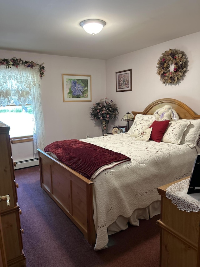 676 N Poor Farm Rd, Harrisville, MI 48740 - bedroom featuring dark carpet and a baseboard heating unit