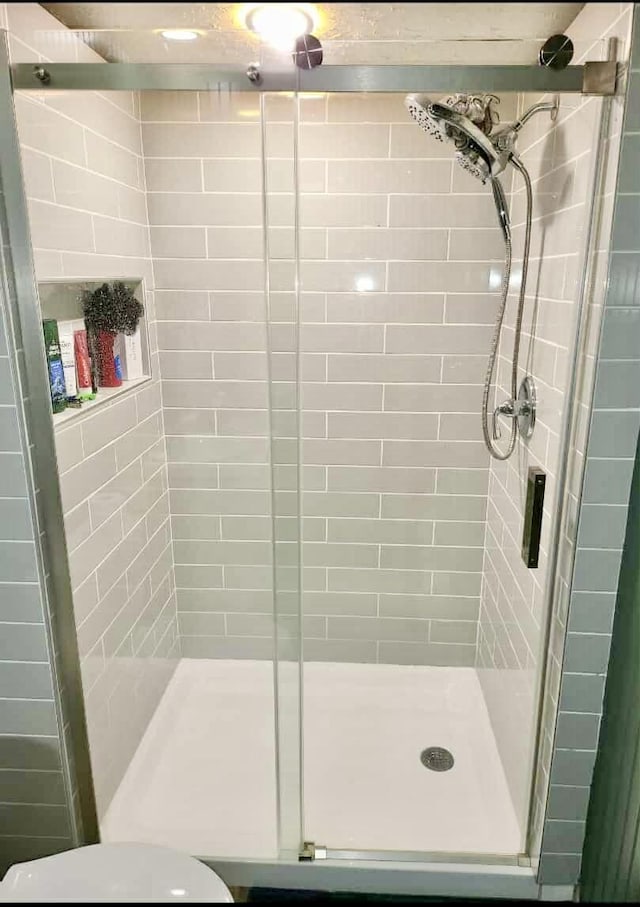 2872 Granger Rd, Lewiston, MI 49756 - bathroom with a stall shower and toilet