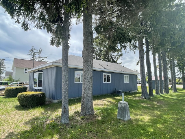 120 S Indiana Ave, Gaylord, MI 49735 - view of side of home with a lawn