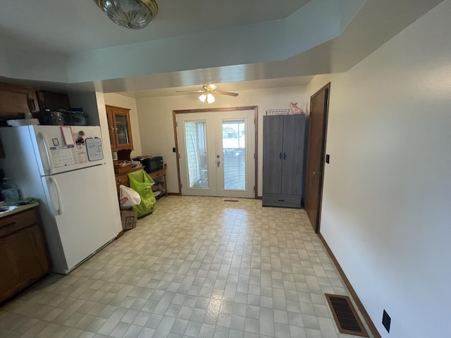120 S Indiana Ave, Gaylord, MI 49735 - foyer with a ceiling fan, light floors, and french doors