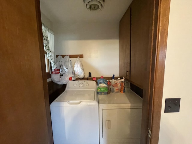 120 S Indiana Ave, Gaylord, MI 49735 - laundry area featuring washer and dryer and cabinet space