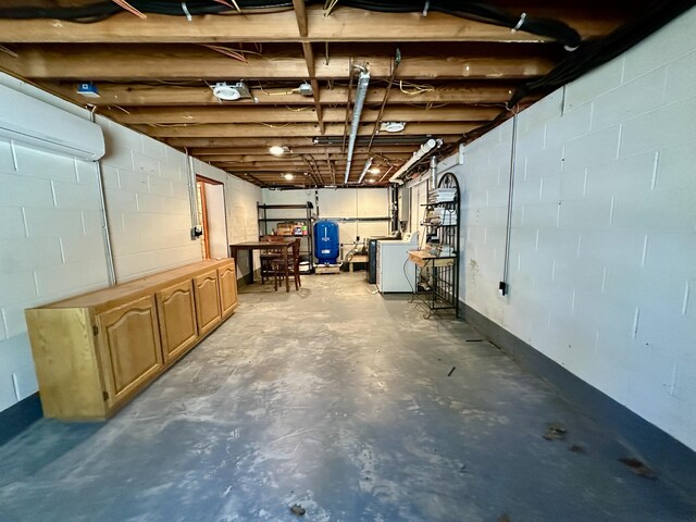 19110 Red Pine Dr, Hillman, MI 49746 - unfinished basement with a water pressure tank, washer / dryer, and concrete block wall