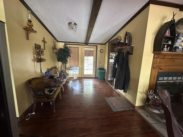 3469 Long Rapids Rd, Alpena, MI 49707 - foyer with a textured ceiling, wood finished floors, beamed ceiling, french doors, and baseboards