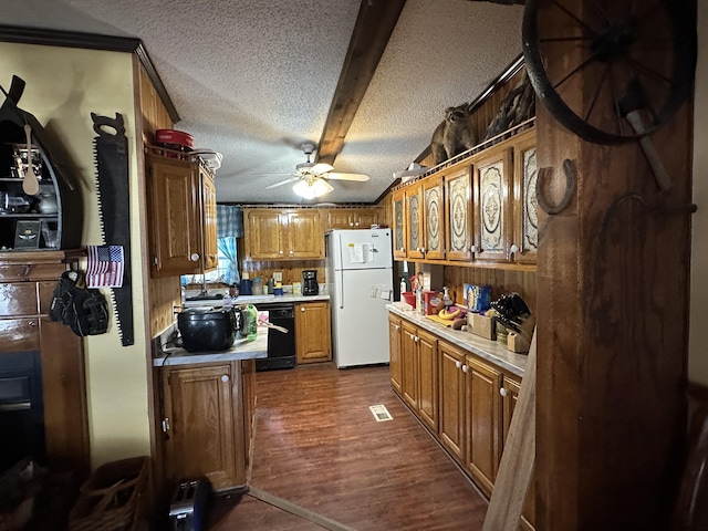 3469 Long Rapids Rd, Alpena, MI 49707 - kitchen with freestanding refrigerator, light countertops, a textured ceiling, a ceiling fan, and dark wood-style floors