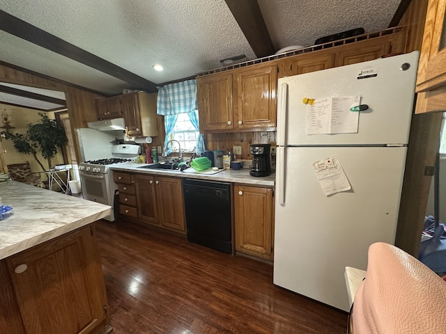 3469 Long Rapids Rd, Alpena, MI 49707 - kitchen with white appliances, a textured ceiling, a sink, light countertops, and dark wood-style flooring