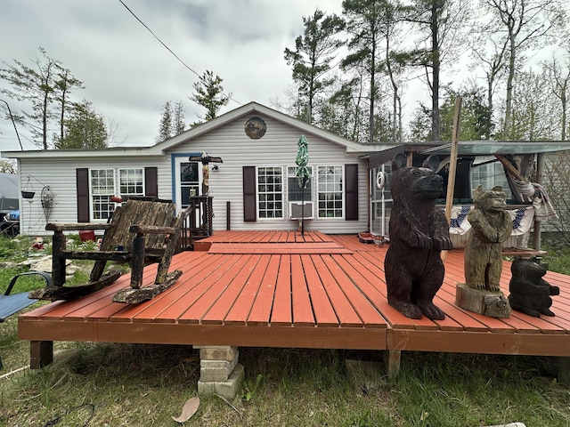 3469 Long Rapids Rd, Alpena, MI 49707 - rear view of house featuring a wooden deck