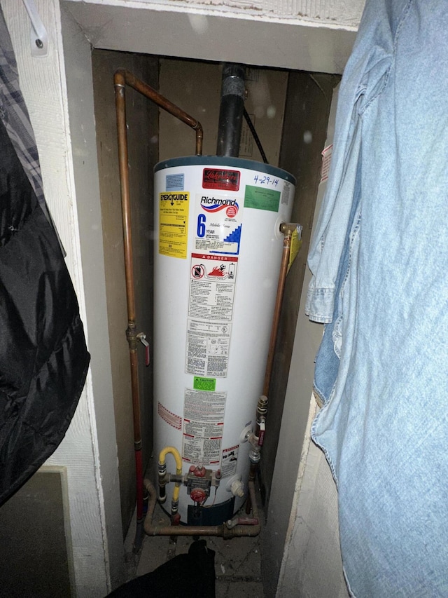 3469 Long Rapids Rd, Alpena, MI 49707 - utility room featuring water heater