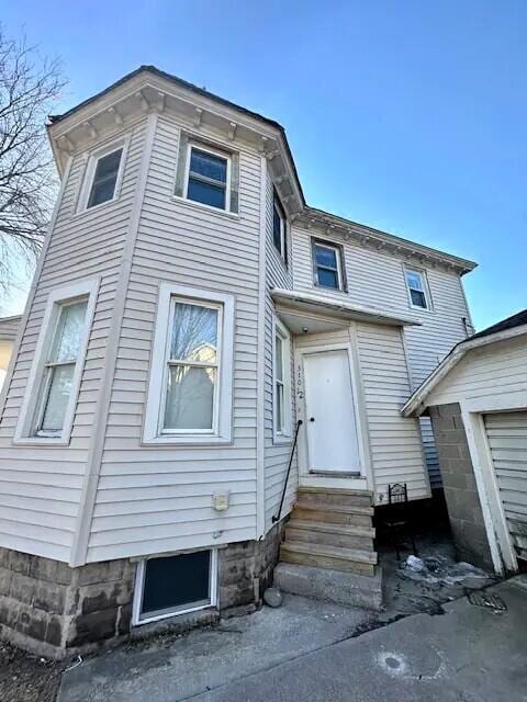 310 W Campbell St, Alpena, MI 49707 - view of front of home featuring entry steps