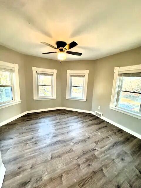 310 W Campbell St, Alpena, MI 49707 - unfurnished room featuring baseboards, wood finished floors, and ceiling fan