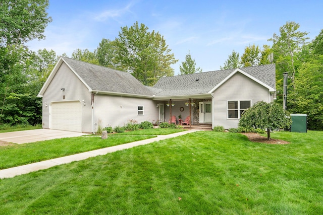 11882 Davis Creek Dr, Wolverine, MI 49799 - single story home featuring an attached garage, driveway, a front yard, and a shingled roof