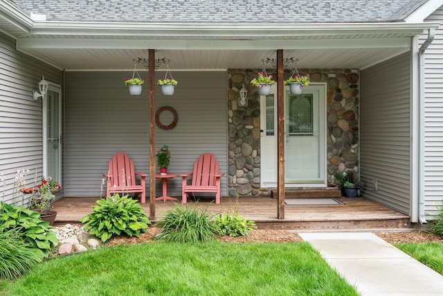 11882 Davis Creek Dr, Wolverine, MI 49799 - entrance to property with covered porch and roof with shingles