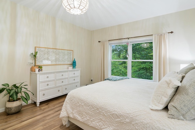 11882 Davis Creek Dr, Wolverine, MI 49799 - bedroom with wood finished floors and baseboards