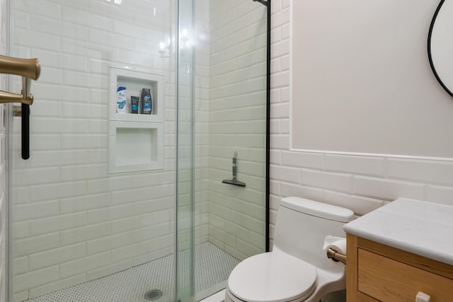 11882 Davis Creek Dr, Wolverine, MI 49799 - bathroom featuring a shower stall, toilet, and vanity