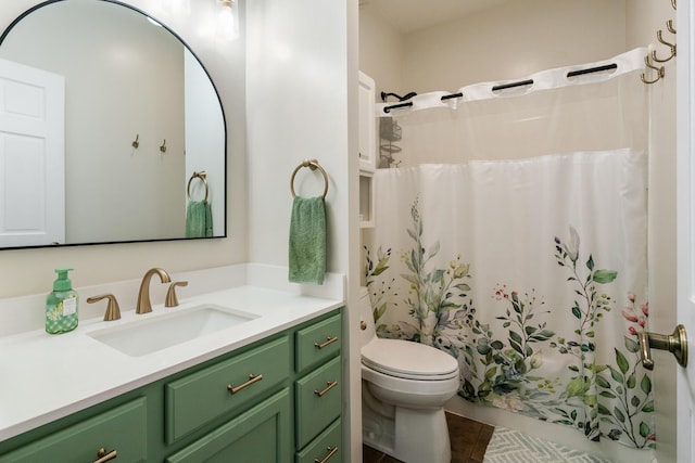 11882 Davis Creek Dr, Wolverine, MI 49799 - bathroom with vanity, toilet, curtained shower, and tile patterned flooring
