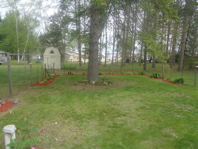 410 Terrace Dr, Houghton Lake, MI 48629 - view of yard with a barn and an outdoor structure