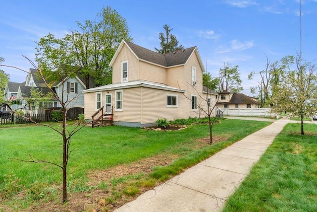 202 E 3rd St, Gaylord, MI 49735 - view of side of property with entry steps