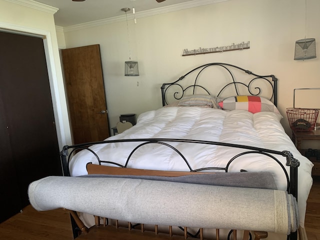 1253 N Partridge Point Rd, Alpena, MI 49707 - bedroom featuring crown molding and wood finished floors