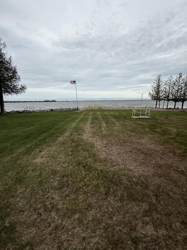 1253 N Partridge Point Rd, Alpena, MI 49707 - view of grassy yard featuring a water view