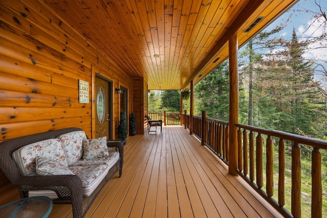 14250 Chippewa Trl, Johannesburg, MI 49751 - view of wooden porch