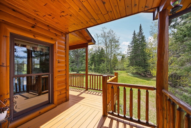 14250 Chippewa Trl, Johannesburg, MI 49751 - wooden terrace with a lawn
