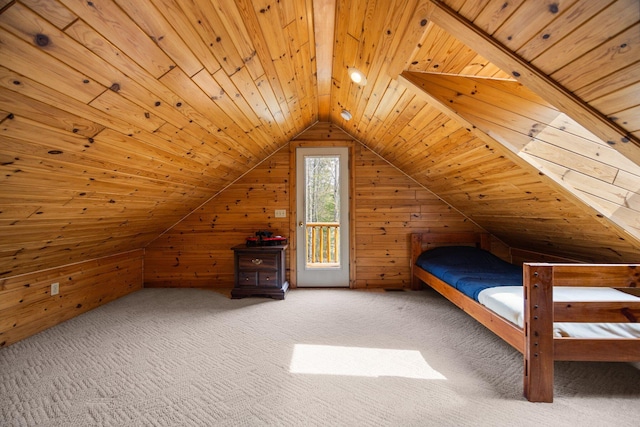 14250 Chippewa Trl, Johannesburg, MI 49751 - unfurnished bedroom with wooden ceiling, wooden walls, lofted ceiling, access to exterior, and carpet floors