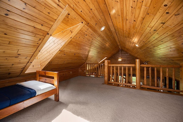 14250 Chippewa Trl, Johannesburg, MI 49751 - unfurnished bedroom with vaulted ceiling, carpet, wooden ceiling, and wood walls