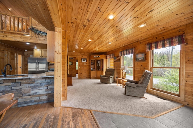 14250 Chippewa Trl, Johannesburg, MI 49751 - living room featuring recessed lighting, wooden walls, and wooden ceiling