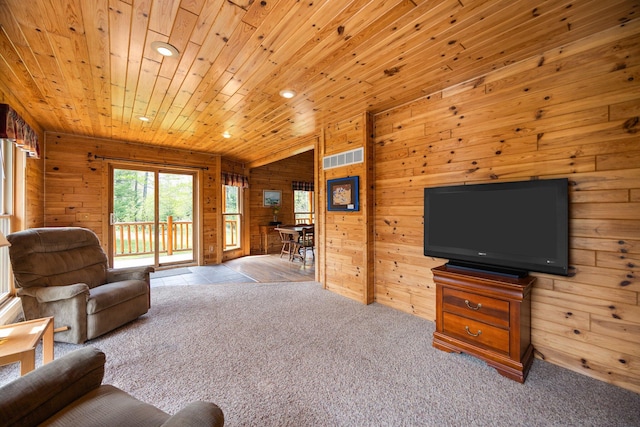 14250 Chippewa Trl, Johannesburg, MI 49751 - living room with wood walls, carpet, wooden ceiling, and recessed lighting