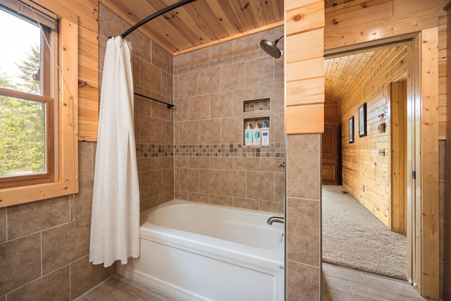 14250 Chippewa Trl, Johannesburg, MI 49751 - bathroom featuring shower / tub combo, wooden ceiling, and wooden walls
