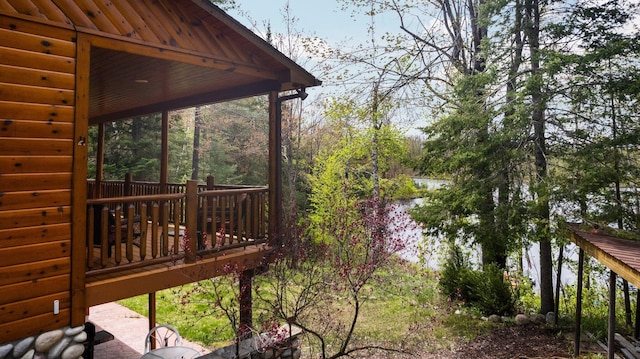 14250 Chippewa Trl, Johannesburg, MI 49751 - view of yard with a deck