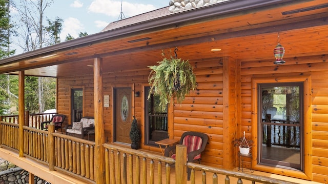 14250 Chippewa Trl, Johannesburg, MI 49751 - view of wooden porch