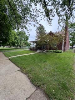 18598 Henry St, Melvindale, MI 48122 - view of front of property featuring a front yard