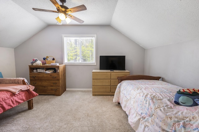 120 Seminole Trl, Roscommon, MI 48653 - bedroom with vaulted ceiling, light carpet, a textured ceiling, and ceiling fan