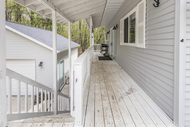 120 Seminole Trl, Roscommon, MI 48653 - wooden terrace with an attached garage