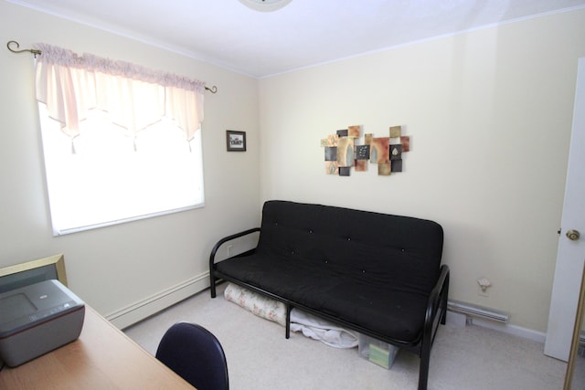 5432 E Michigan Hwy, Roscommon, MI 48653 - living area featuring a baseboard heating unit, carpet floors, a desk, and baseboards
