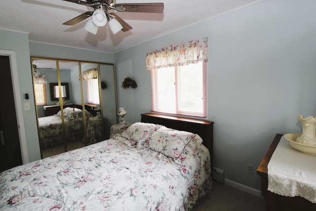 5432 E Michigan Hwy, Roscommon, MI 48653 - bedroom with carpet floors, a closet, ceiling fan, crown molding, and baseboards