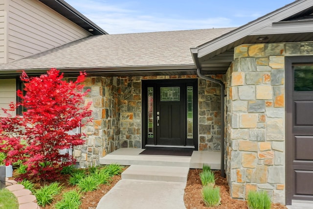 6801 Driftwood Cv, Saint Helen, MI 48656 - entrance to property with stone siding and a shingled roof