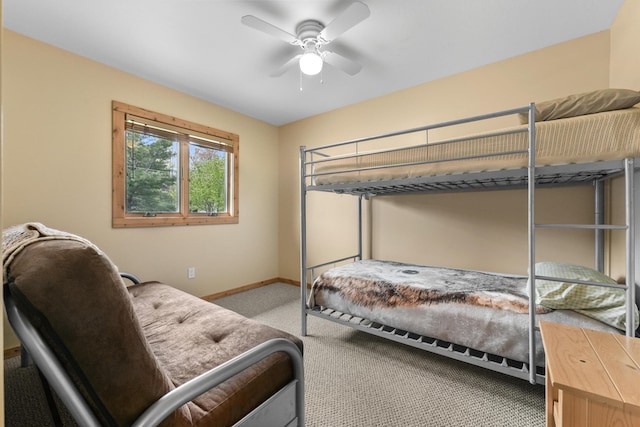 6801 Driftwood Cv, Saint Helen, MI 48656 - bedroom with carpet flooring, baseboards, and ceiling fan
