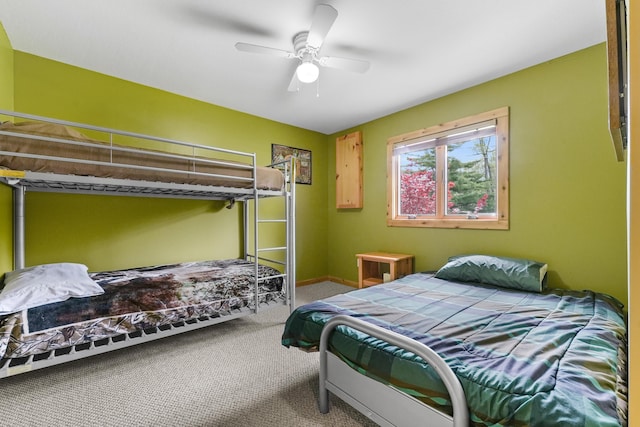 6801 Driftwood Cv, Saint Helen, MI 48656 - carpeted bedroom featuring ceiling fan and baseboards