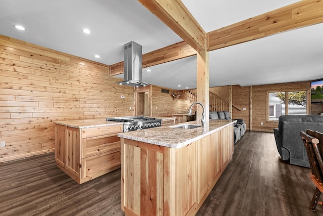 6801 Driftwood Cv, Saint Helen, MI 48656 - kitchen with light brown cabinets, island exhaust hood, a sink, wooden walls, and dark wood-type flooring