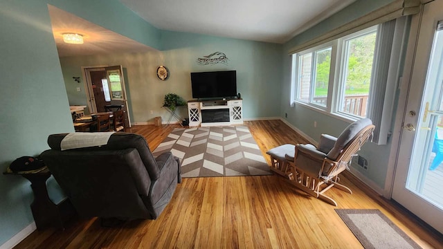 8619A Iowa St, Oscoda, MI 48750 - living area with wood finished floors and baseboards