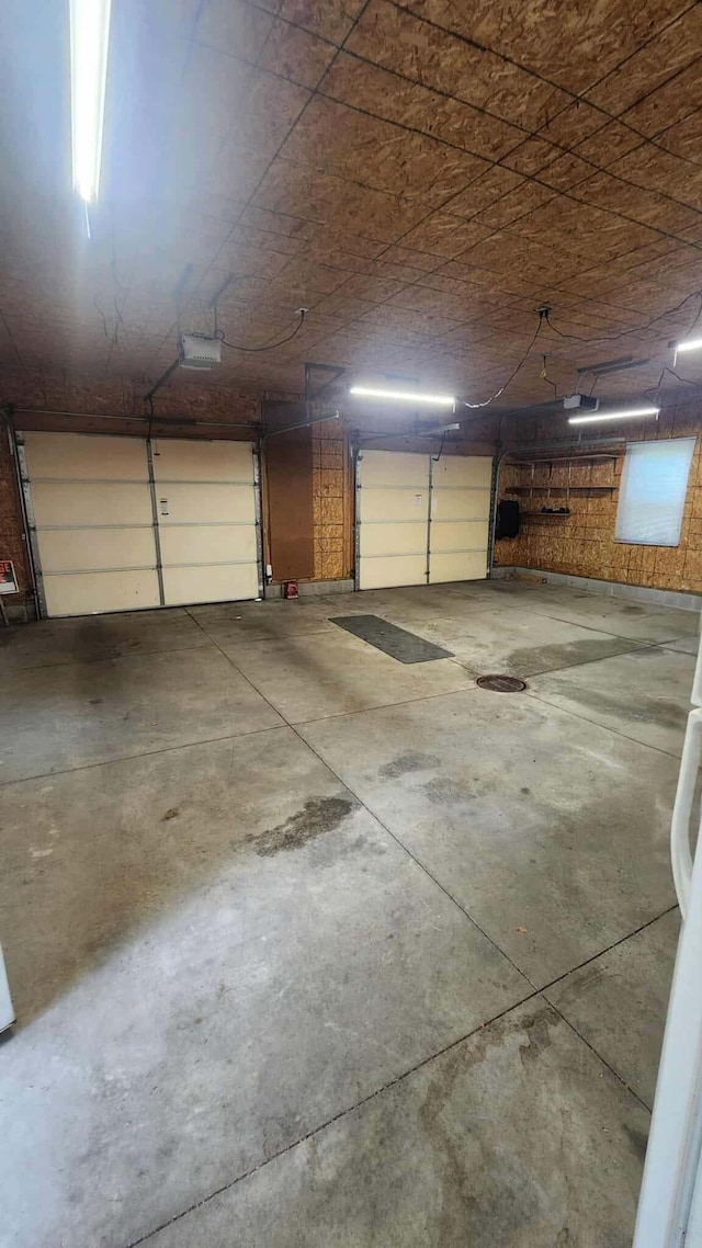 8619A Iowa St, Oscoda, MI 48750 - garage with a garage door opener