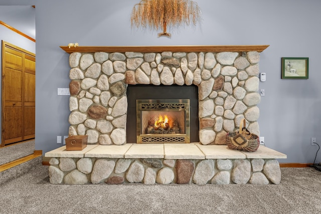 4285 Tower Hill Rd, Houghton Lake, MI 48629 - detailed view of carpet, baseboards, and a fireplace