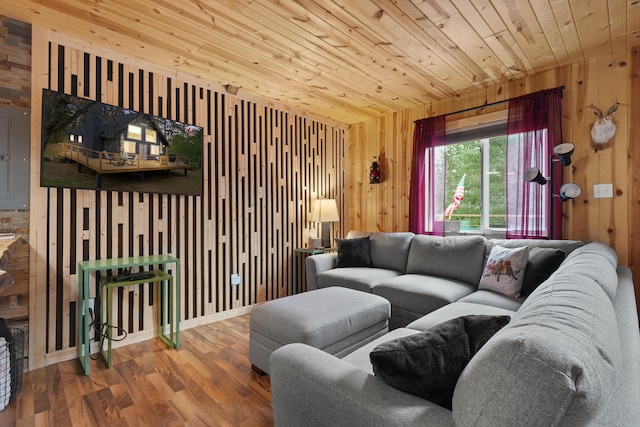 7028 Merrio Rd, Grayling, MI 49738 - living room featuring wooden ceiling, wood finished floors, and wood walls