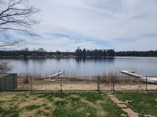 7305 Chain Lake Dr, South Branch, MI 48761 - dock area with a water view and a gate