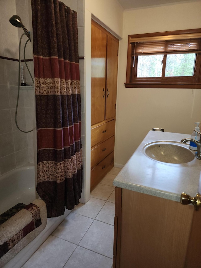 7305 Chain Lake Dr, South Branch, MI 48761 - full bathroom featuring tile patterned floors, vanity, and shower / bath combination with curtain