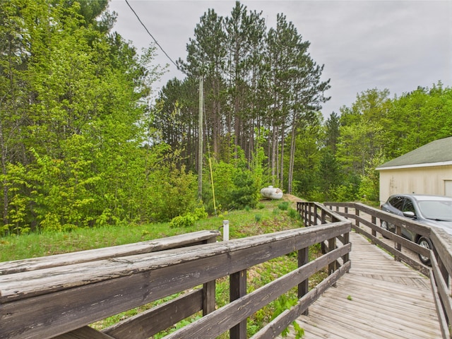 730 SE Cool Rd, Kalkaska, MI 49646 - deck with a view of trees