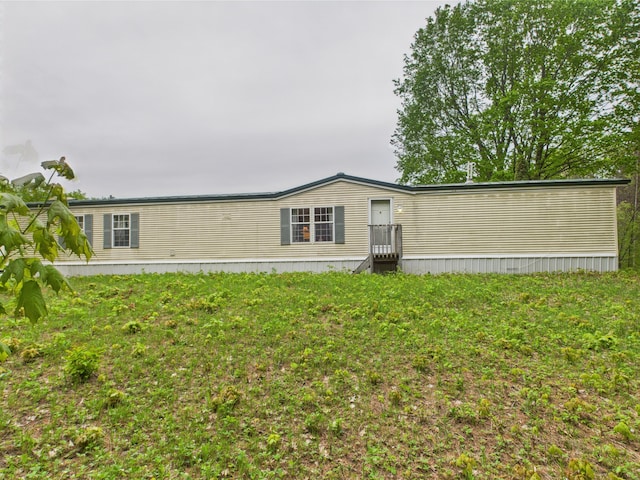 730 SE Cool Rd, Kalkaska, MI 49646 - view of rear view of house