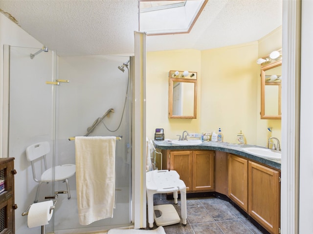 730 SE Cool Rd, Kalkaska, MI 49646 - bathroom with an enclosed shower, a textured ceiling, and double vanity